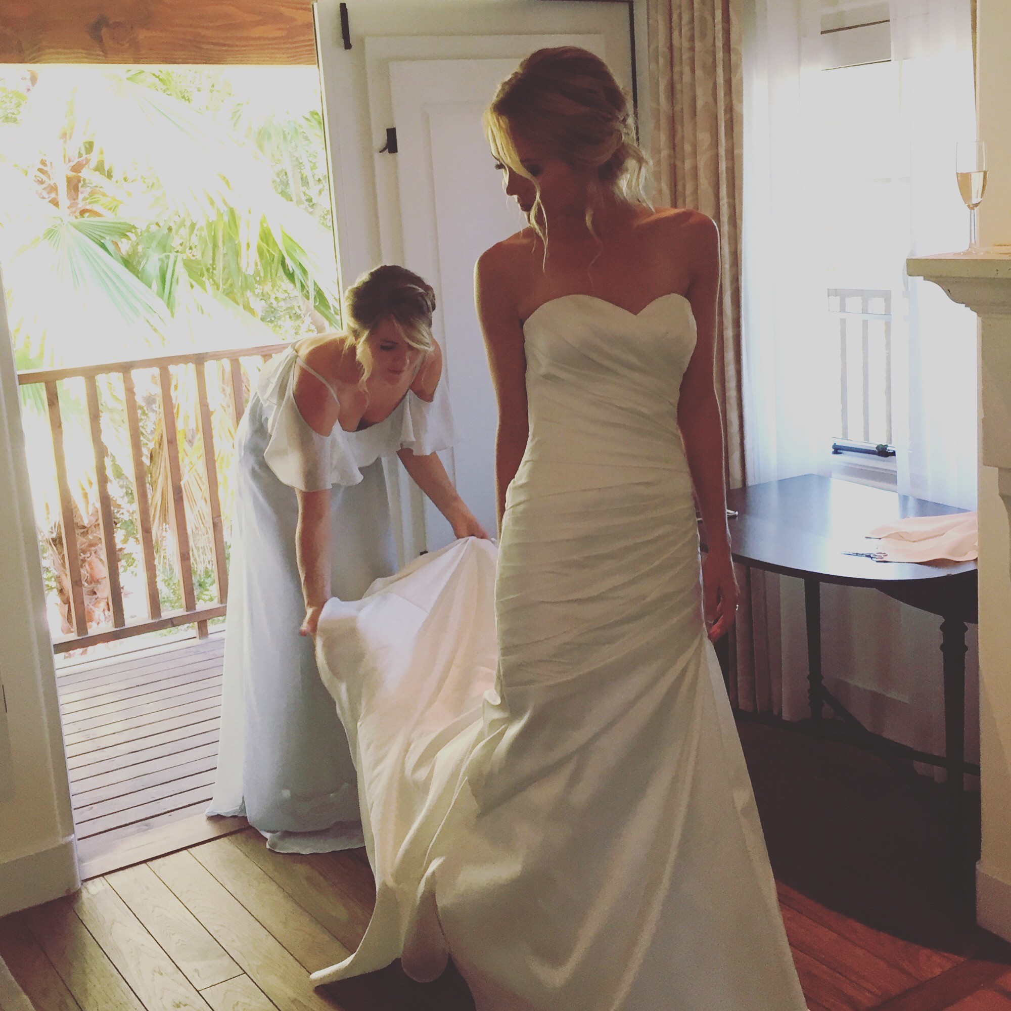 My beautiful girls as maid of honor and bride in the bridal suite pre-ceremony.  I took this photo in a private moment with just the three of us on the cusp of a new and wonderful chapter in our lives.